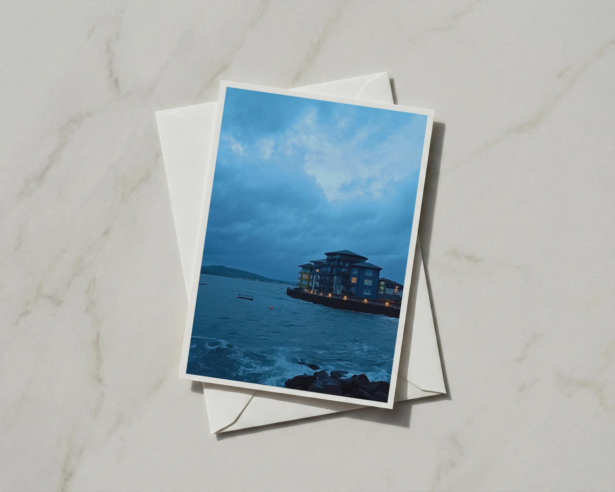 Coastal Dusk Greeting Card, Moody Blue Seaside Town, Stormy Sky Waterfront Card