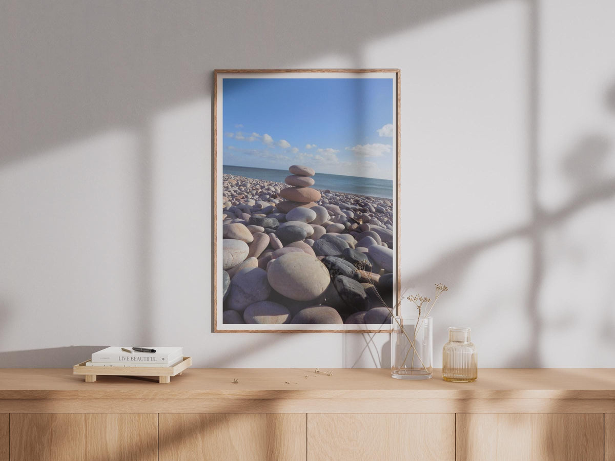 Stacked Pebbles Beach Poster, Zen Stone Cairn Wall Art, Coastal Photography Print, Mindful Ocean Decor, Pebble Shore Seaside Art Print