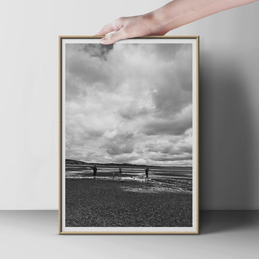 Black and White Beach Photography Print, Figures on Shoreline Poster, Coastal Wall Art, Dramatic Sky, Moody Seaside Print for Living Room