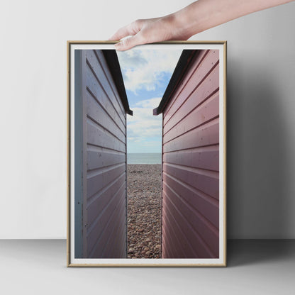 Beach Hut Photography Print, Pebble Beach Coastal Poster, British Seaside Wall Art, Pink Pastel Huts, UK Coast Photo Print