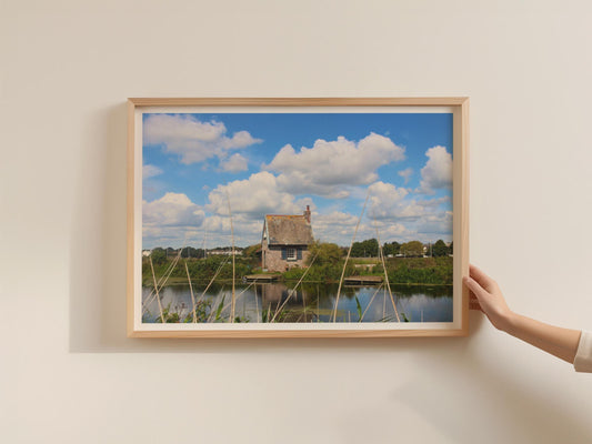 Stone Cottage by the Water Poster, English Countryside Framed-Print, Rural Lake Landscape, Blue Sky Wall Art, Rustic Lakeside Home Print