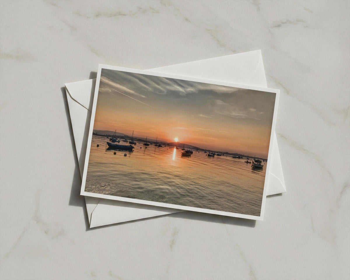 Sunset Harbour A6 Card, Coastal Boats at Dusk, Orange Sky Seascape Greeting Card