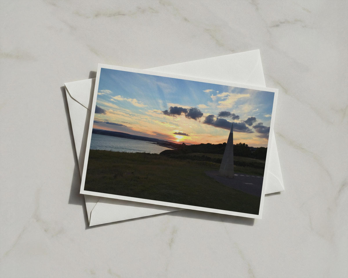 Coastal Sunset Obelisk Landmark Card, Dawn Dusk Seascape, Dramatic Sky Greeting Card