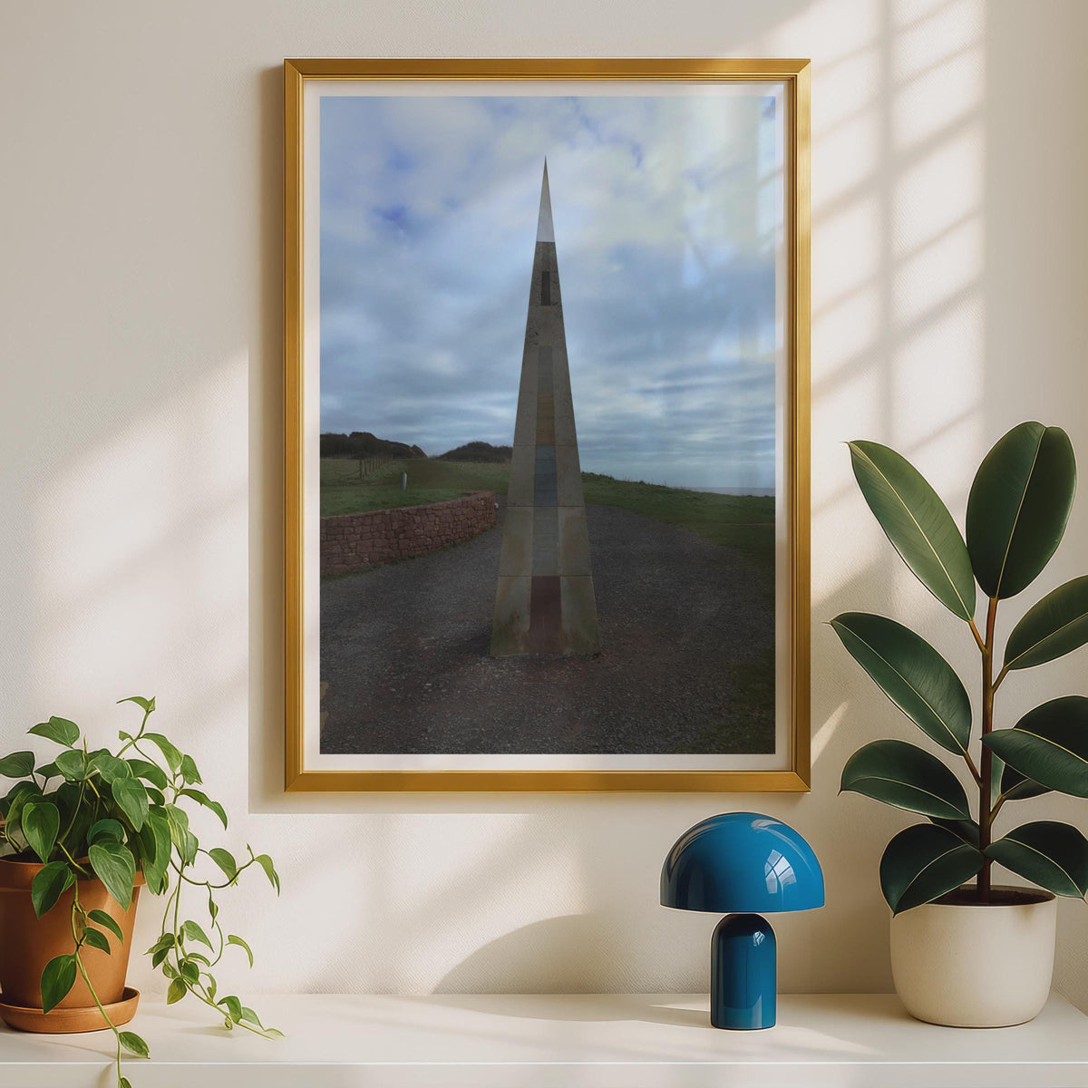Coastal Obelisk Monument Poster, Stone Spire Landmark Wall Art Print, Dramatic Sky Sculpture Photography, Moody Coastal Landscape Print