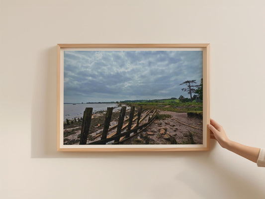 Wooden Boat Wreck Estuary Poster, Moody Coastal Landscape Framed-Print, British Shoreline Wall Art, Rustic Nautical Decor, Cloudy Sky Print