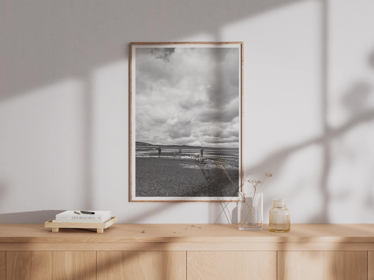 Black and White Beach Photography Print, Figures on Shoreline Poster, Coastal Wall Art, Dramatic Sky, Moody Seaside Print for Living Room